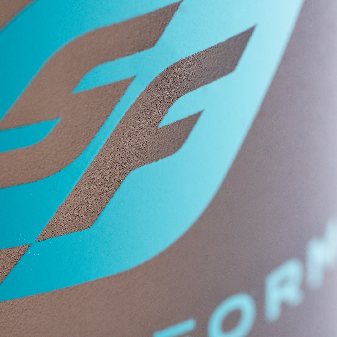 Close-up of Sniperform SF logo on Protein Mixer shaker bottle - teal branding detail